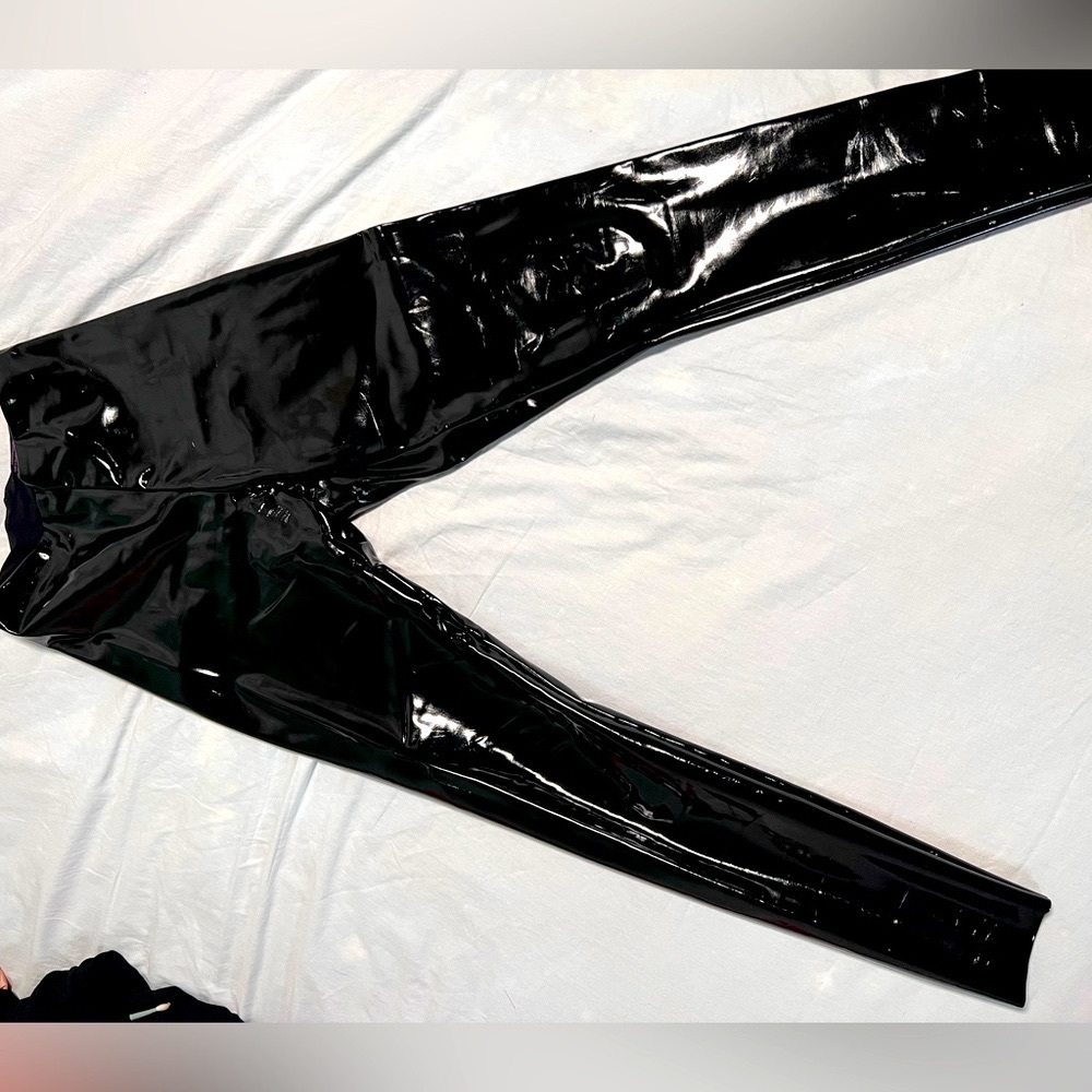 Black. Patent leather leggings.